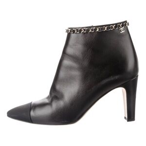 CHANEL Black Leather Ankle Booties with Chain Accent